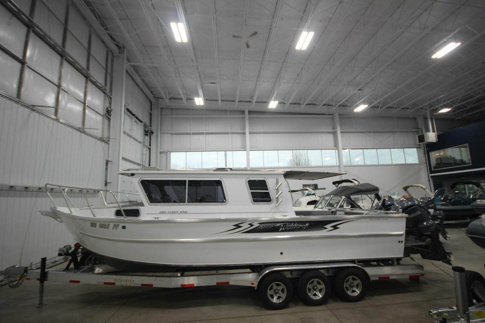 Slide: The Image of Weldcraft 280 Cuddy King T250XCB's & Custom Aluminum 15K Trailer 2023 - 5180433