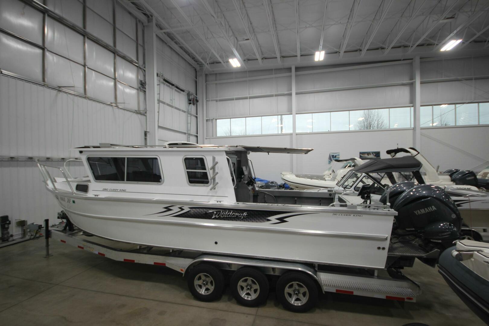 Slide: The Image of Weldcraft 280 Cuddy King T250XCB's & Custom Aluminum 15K Trailer 2023 - 5180434