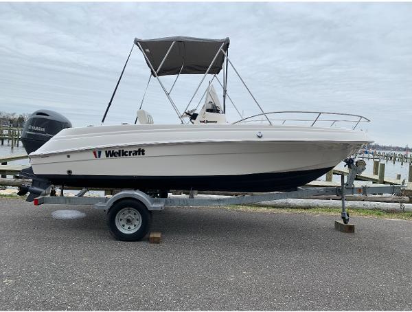 Slide: The Image of 2017 Wellcraft 180 Fisherman boat on trailer with Yamaha outboard motor. - 1