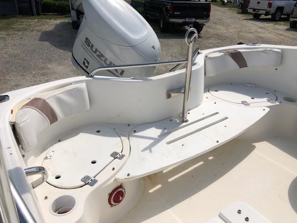 Slide: The Image of 2001 Wellcraft 180 Sportsman boat interior with Suzuki outboard motor. - 12