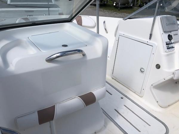 Slide: The Image of 2001 Wellcraft 180 Sportsman boat interior with seating and control panel. - 13