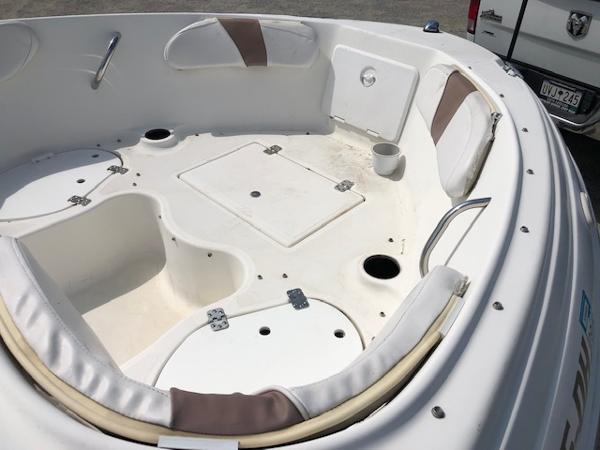 Slide: The Image of 2001 Wellcraft 180 Sportsman boat interior with seating and storage compartments. - 14