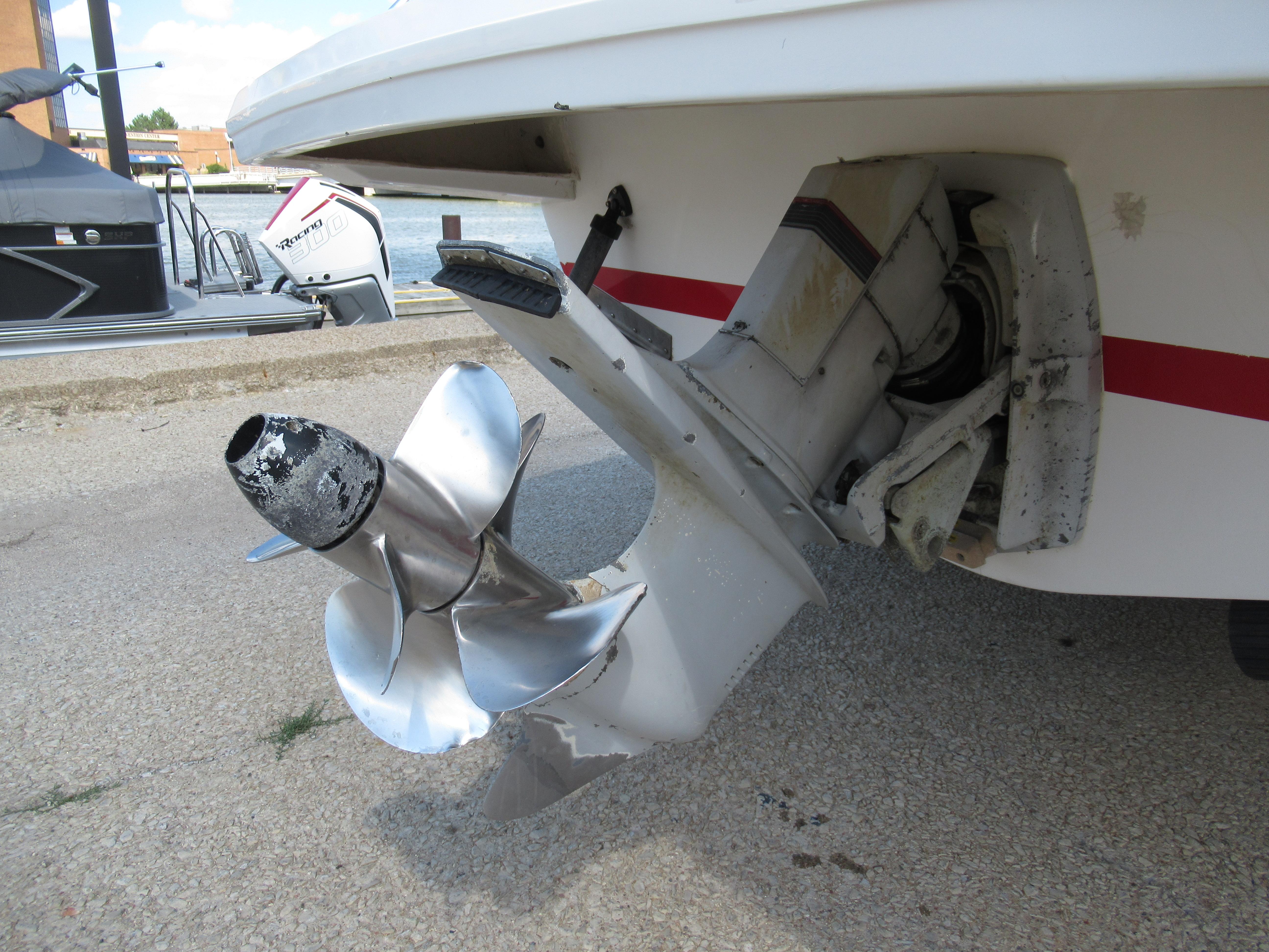 Slide: The Image of Close-up of a 1990 Wellcraft 23 NOVA boat propeller and stern drive. - 3