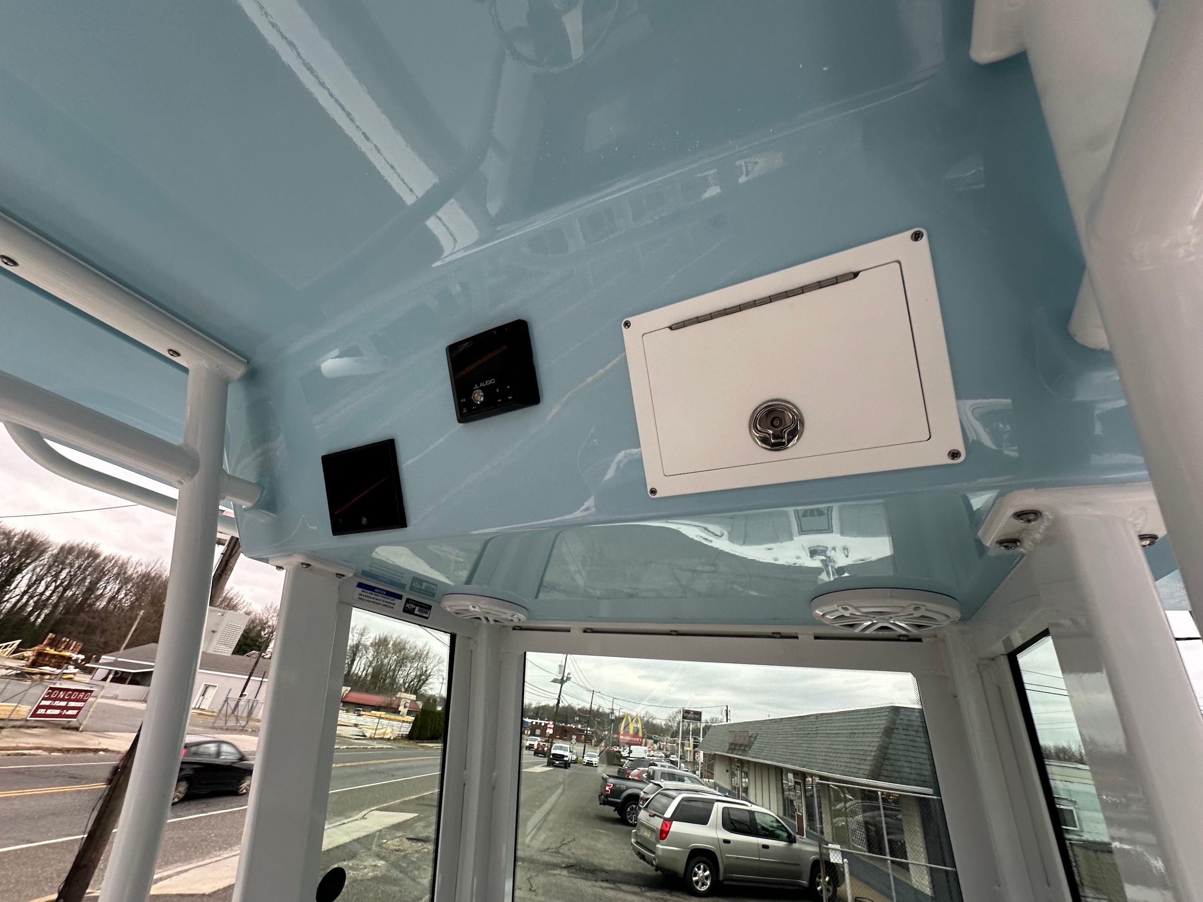 Slide: The Image of Interior view of 2024 Wellcraft 243 Fisherman boat's helm station. - 19