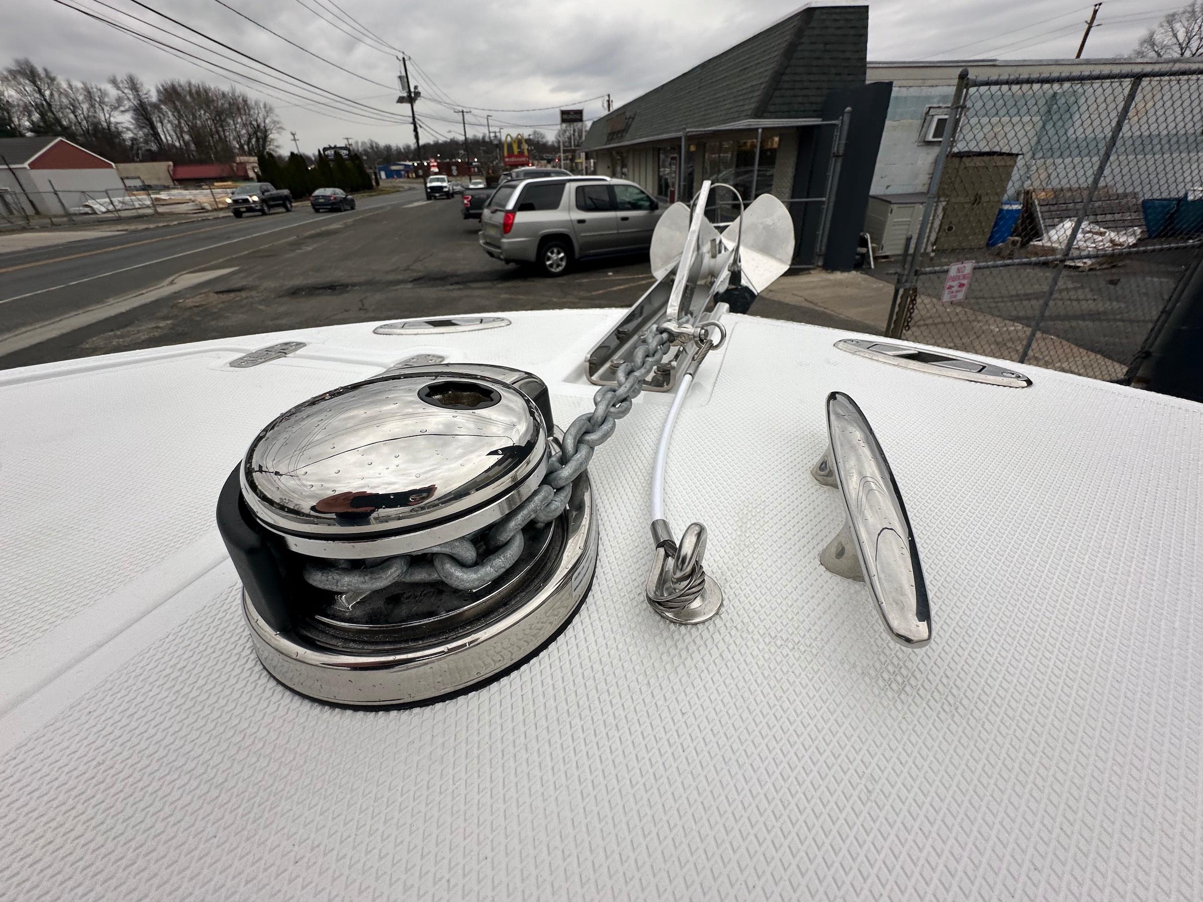 Slide: The Image of 2024 Wellcraft 243 Fisherman boat anchor and chain on deck. - 26
