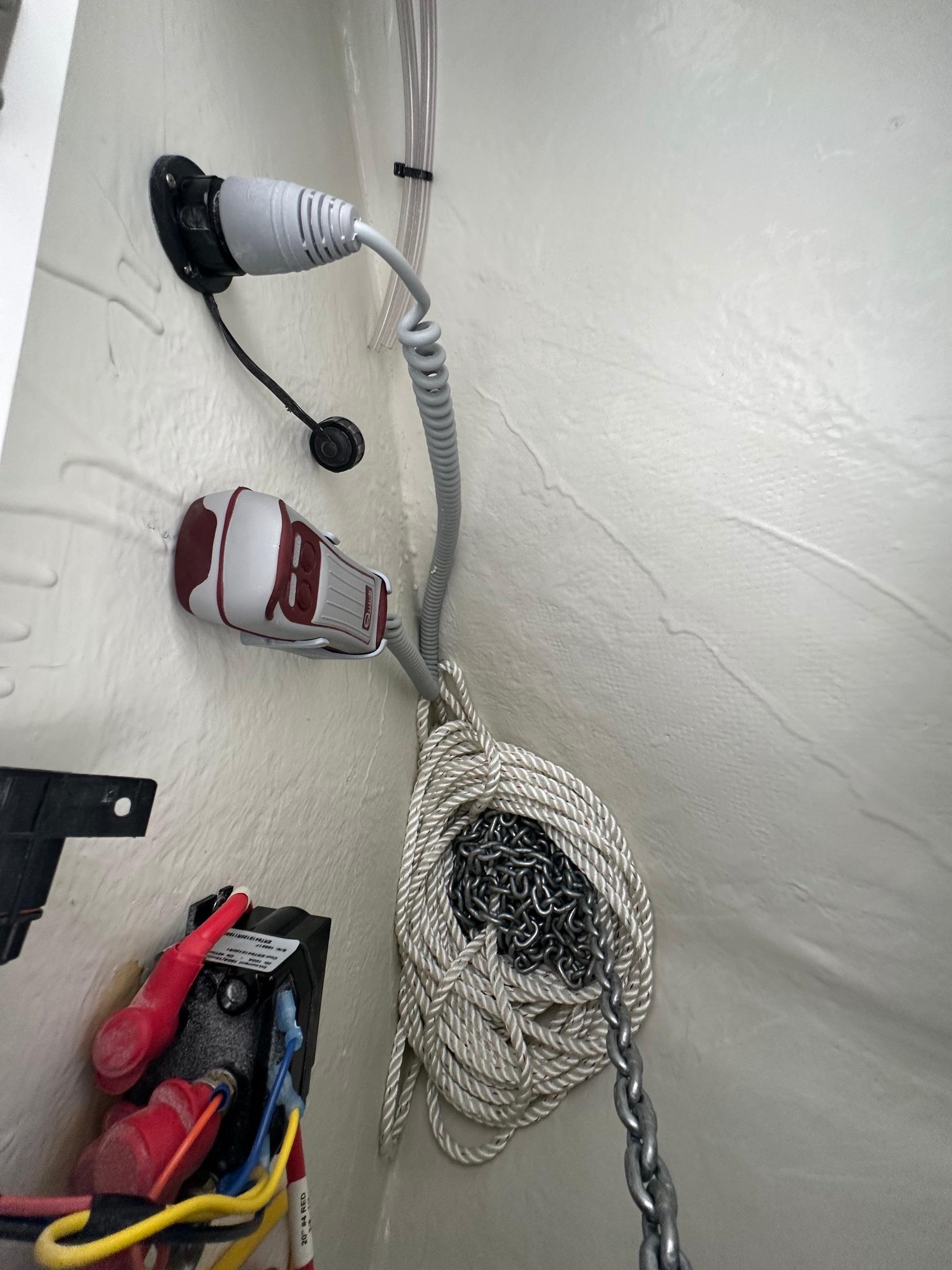 Slide: The Image of 2024 Wellcraft 243 Fisherman boat interior wiring and anchor chain storage. - 27