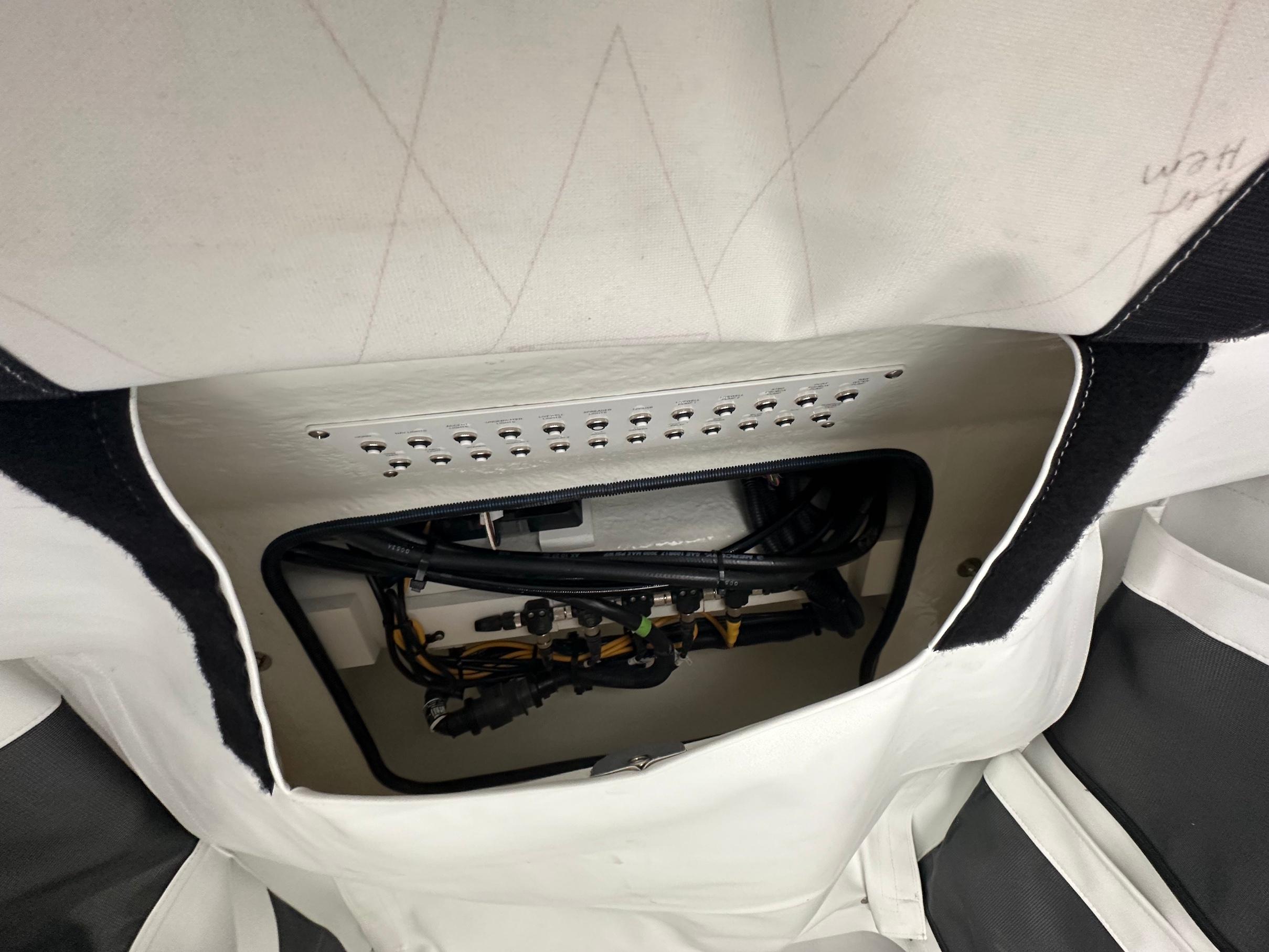 Slide: The Image of 2024 Wellcraft 243 Fisherman boat interior wiring and control panel. - 32
