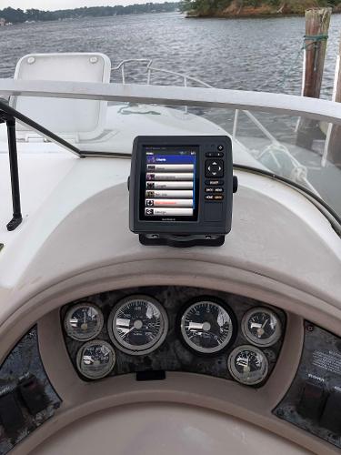 Slide: The Image of 1998 Wellcraft 260 SE boat dashboard with navigation system. - 8