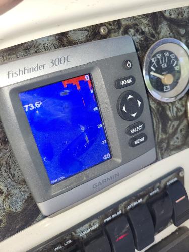 Slide: The Image of Garmin Fishfinder 300C on 1997 Wellcraft 2800 Martinique boat dashboard. - 4