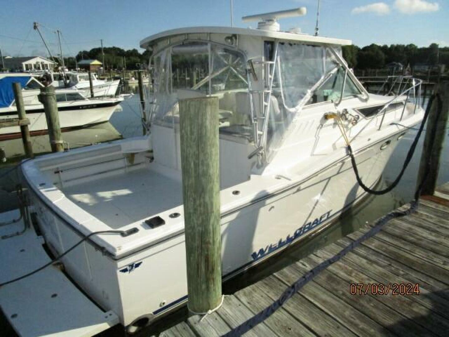 Slide: The Image of 33' Wellcraft starboard aft profile2 - 4494766