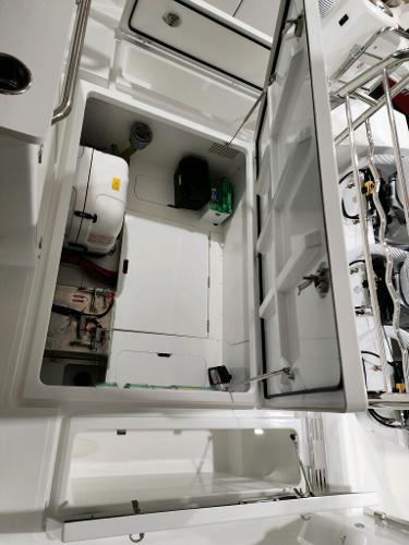 Slide: The Image of 2024 Wellcraft 355 Commuter engine compartment with open hatch. - 13