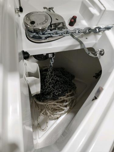 Slide: The Image of 2024 Wellcraft 355 Commuter anchor chain and rope storage compartment. - 21