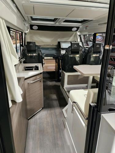 Slide: The Image of Interior of 2024 Wellcraft 355 Commuter boat with modern amenities and seating. - 24