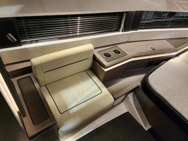 Slide: The Image of Interior seating and table area of 2024 Wellcraft 355 Commuter boat. - 39
