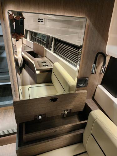 Slide: The Image of Interior of 2024 Wellcraft 355 Commuter with mirror, seating, and storage. - 46