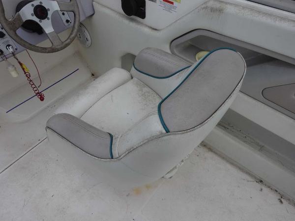 Slide: The Image of 1996 Wellcraft 2400S ECLIPSE boat interior with steering wheel and seat. - 6