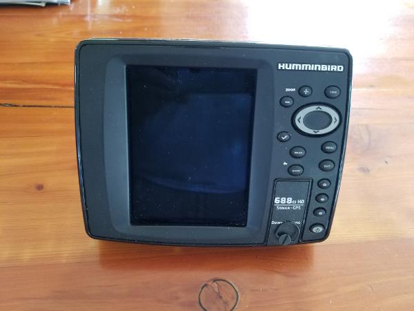 Slide: The Image of Humminbird 688ci HD Sonar GPS unit on wooden surface, Wellcraft 23 NOVA XL 1988. - 5