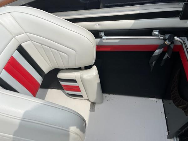 Slide: The Image of 1987 Wellcraft Nova Spyder 26 interior with white, red, and black upholstery. - 7