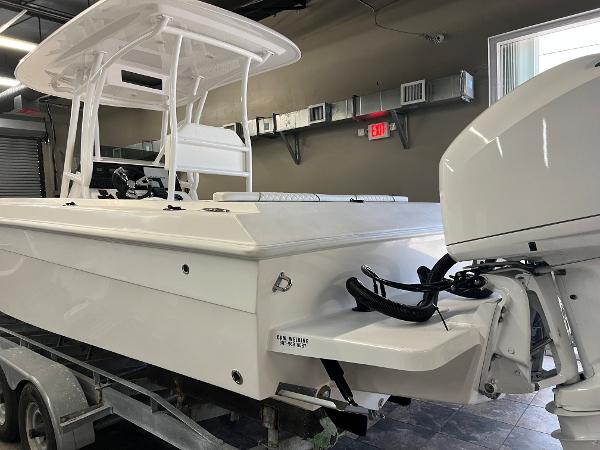 Slide: The Image of 1979 Wellcraft Scarab Sport 302 boat on trailer in indoor storage. - 42