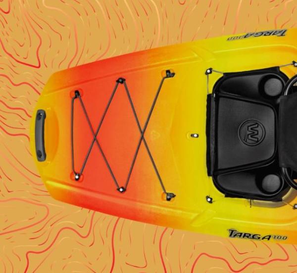 Slide: The Image of Top view of a 2023 Wilderness Systems Targa 100 kayak with vibrant orange and yellow design. - 5