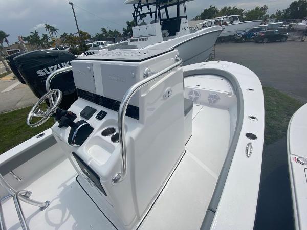 Slide: The Image of 2023 Xplor x24 Andros boat with Suzuki engine, white interior, and modern console. - 3