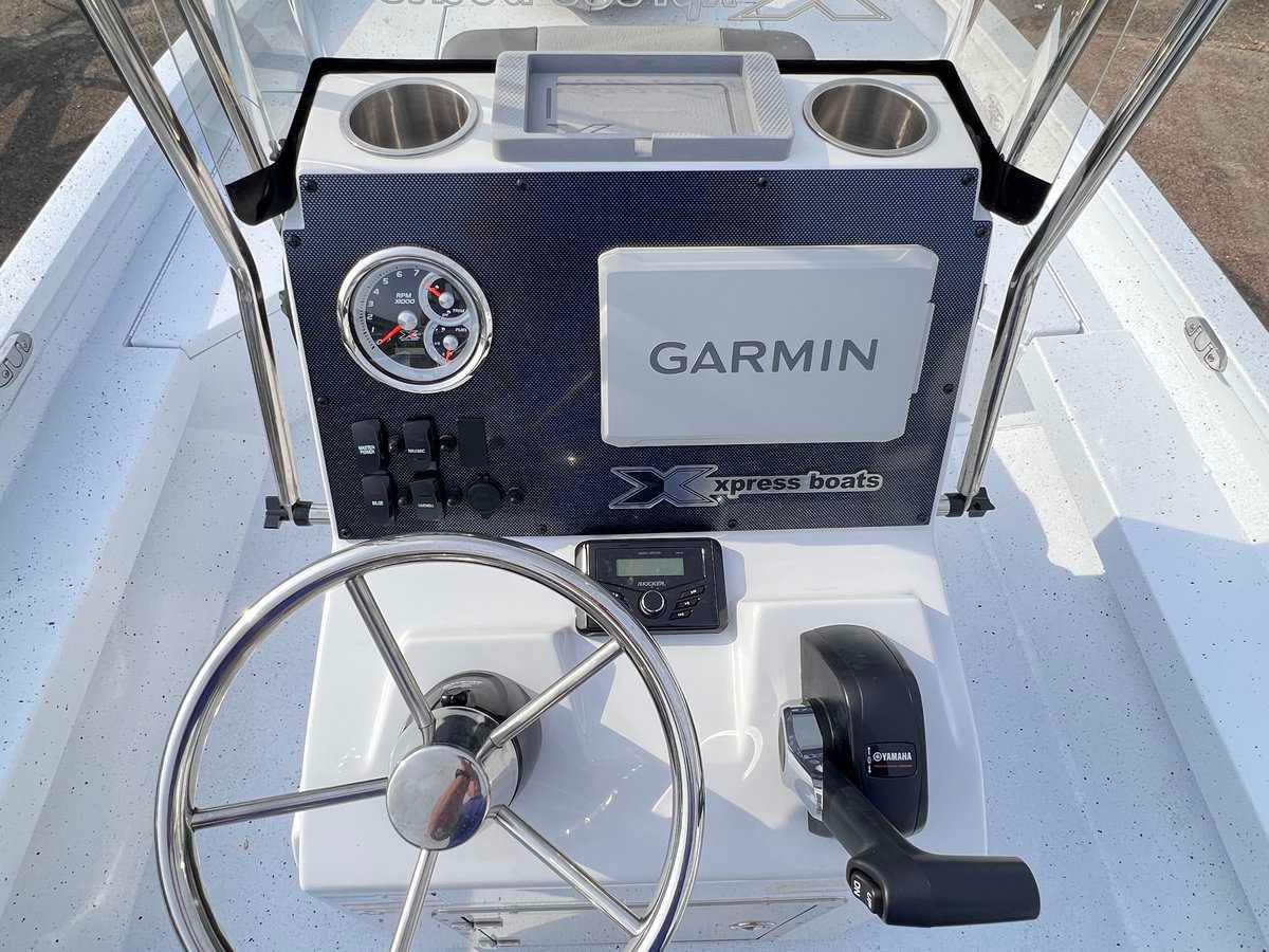 Slide: The Image of 2024 Xpress H20B Hyper-Lift Bay boat console with Garmin navigation system. - 3