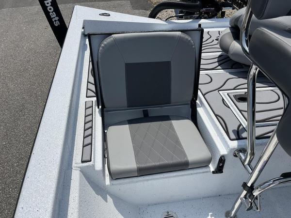 Slide: The Image of 2025 Xpress H22B boat seat with gray upholstery and sleek design. - 16