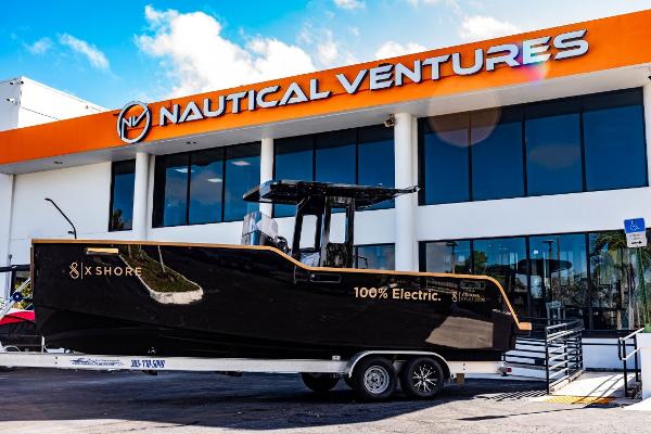 Slide: The Image of 2023 X Shore Eelex 8000 electric boat at Nautical Ventures dealership. - 0