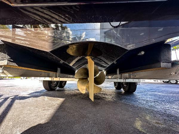 Slide: The Image of Propeller and hull of 2023 X Shore Eelex 8000 electric boat on trailer. - 10