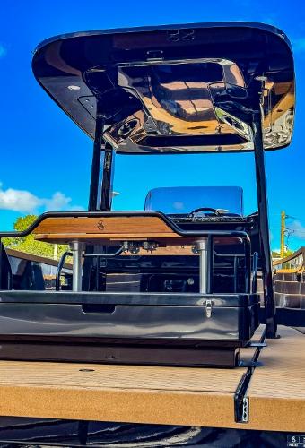 Slide: The Image of 2023 X Shore Eelex 8000 electric boat with sleek design and modern features. - 4