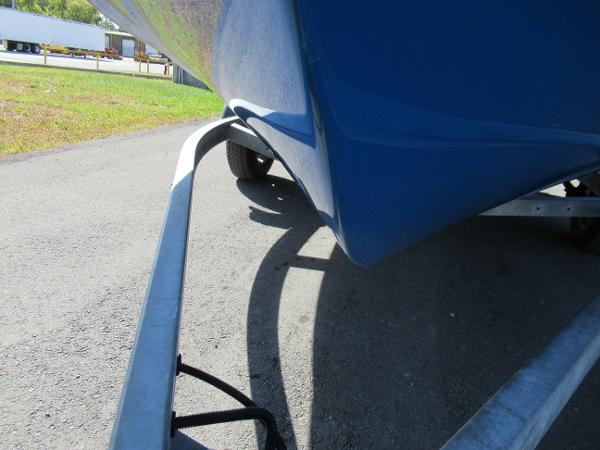 Slide: The Image of 2015 Yamaha Boats AR192 on a trailer, close-up of the hull and trailer frame. - 7