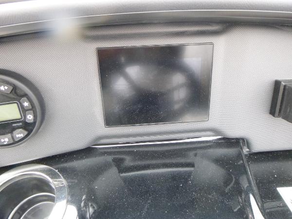 Slide: The Image of 2024 Yamaha Boats AR195 dashboard with touchscreen and controls. - 15