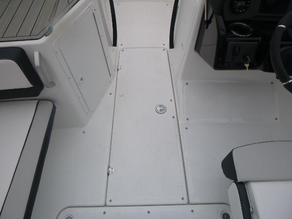 Slide: The Image of 2024 Yamaha Boats AR195 interior deck with seating and control panel. - 20