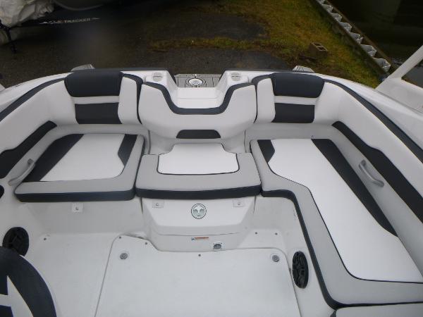Slide: The Image of 2024 Yamaha AR195 boat interior with sleek white and black seating. - 28