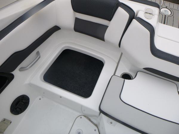 Slide: The Image of 2024 Yamaha Boats AR195 interior seating with storage compartment. - 29