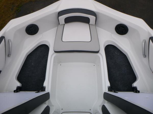 Slide: The Image of 2024 Yamaha AR195 boat interior with sleek seating and modern design. - 7