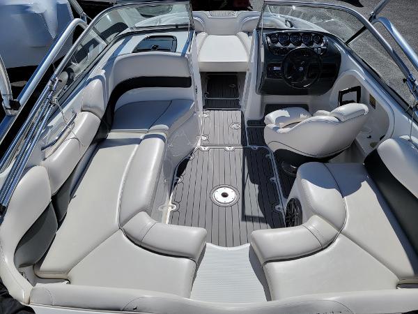 Slide: The Image of 2007 Yamaha Boats SX210 interior with seating and steering console. - 13