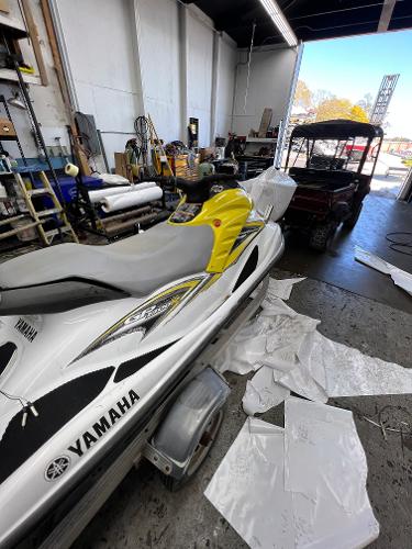 Slide: The Image of 2005 Yamaha WaveRunner GP 800R in a workshop. - 5