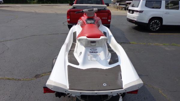 Slide: The Image of 2005 Yamaha WaveRunner VX 110 Sport with red seat on trailer. - 2