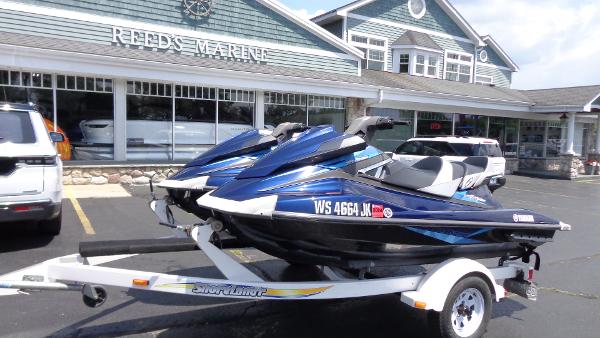 Slide: The Image of 2015 Yamaha WaveRunner VX Cruiser jet skis on trailer at Reeds Marine. - 1