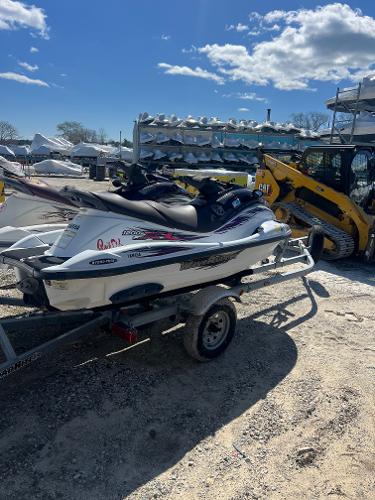 Slide: The Image of 1999 Yamaha WaveRunner XL 1200 on a trailer in a boatyard. - 3