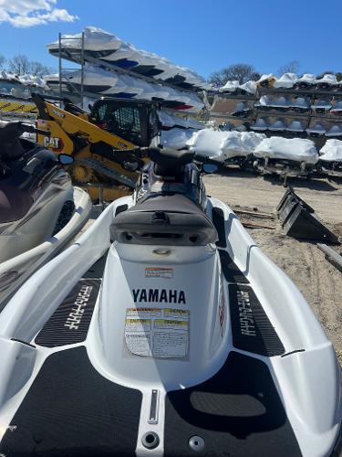 Slide: The Image of 1999 Yamaha WaveRunner XL 1200 jet ski in a storage yard with other boats. - 4