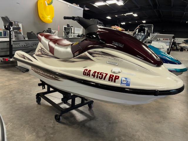 Slide: The Image of 2000 Yamaha WaveRunner XL 800 jet ski displayed indoors on a stand. - 1