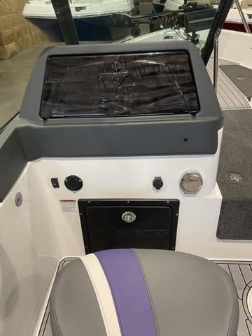 Slide: The Image of 2023 Yar-Craft 209 TFX boat dashboard with seat and control panel. - 10