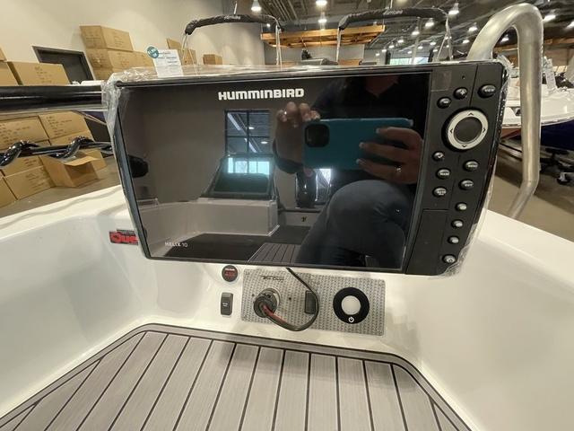 Slide: The Image of 2023 Yar-Craft 209 TFX boat with Humminbird fish finder and control panel. - 13