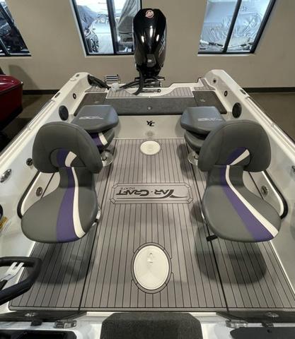Slide: The Image of 2023 Yar-Craft 209 TFX boat interior with seating and motor. - 16