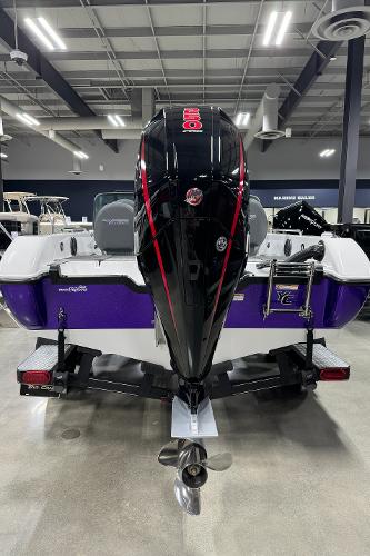 Slide: The Image of 2023 Yar-Craft 209 TFX boat with a powerful outboard motor in a showroom. - 3