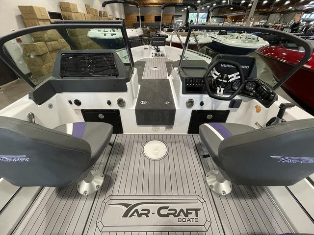 Slide: The Image of 2023 Yar-Craft 209 TFX boat interior with dual seats and advanced dashboard. - 7