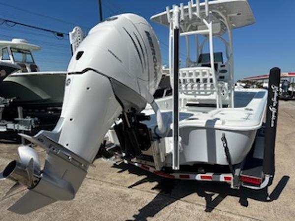 Slide: The Image of 2020 Yellowfin 24 Bay CE boat with powerful outboard motor on trailer. - 13