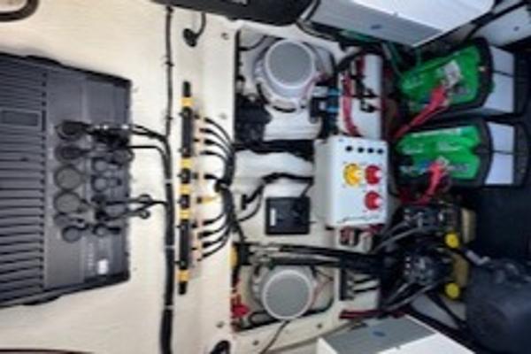 Slide: The Image of Electrical system of a 2020 Yellowfin 24 Bay CE boat, featuring wiring and components. - 24